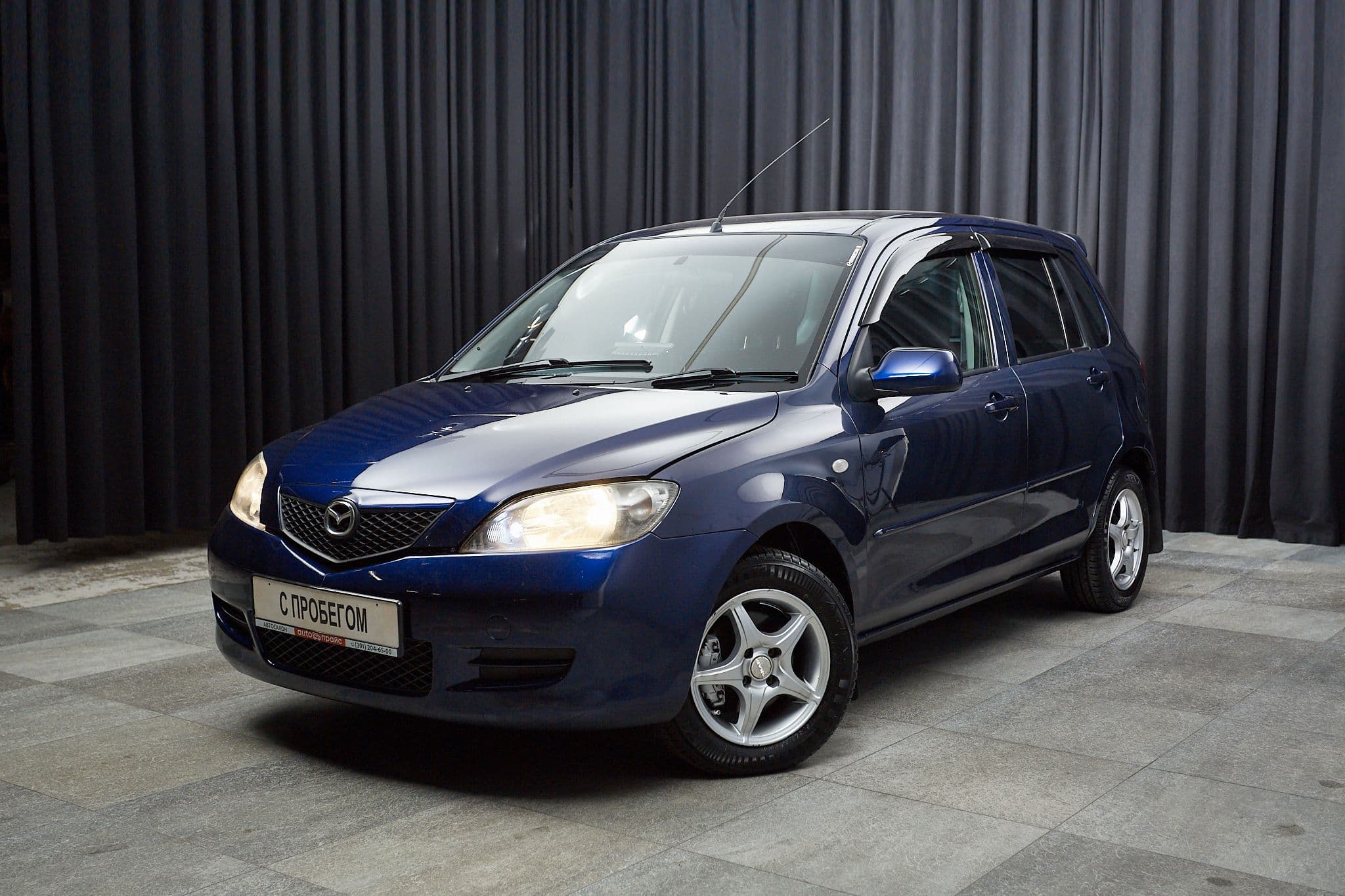 Mazda Demio - 1