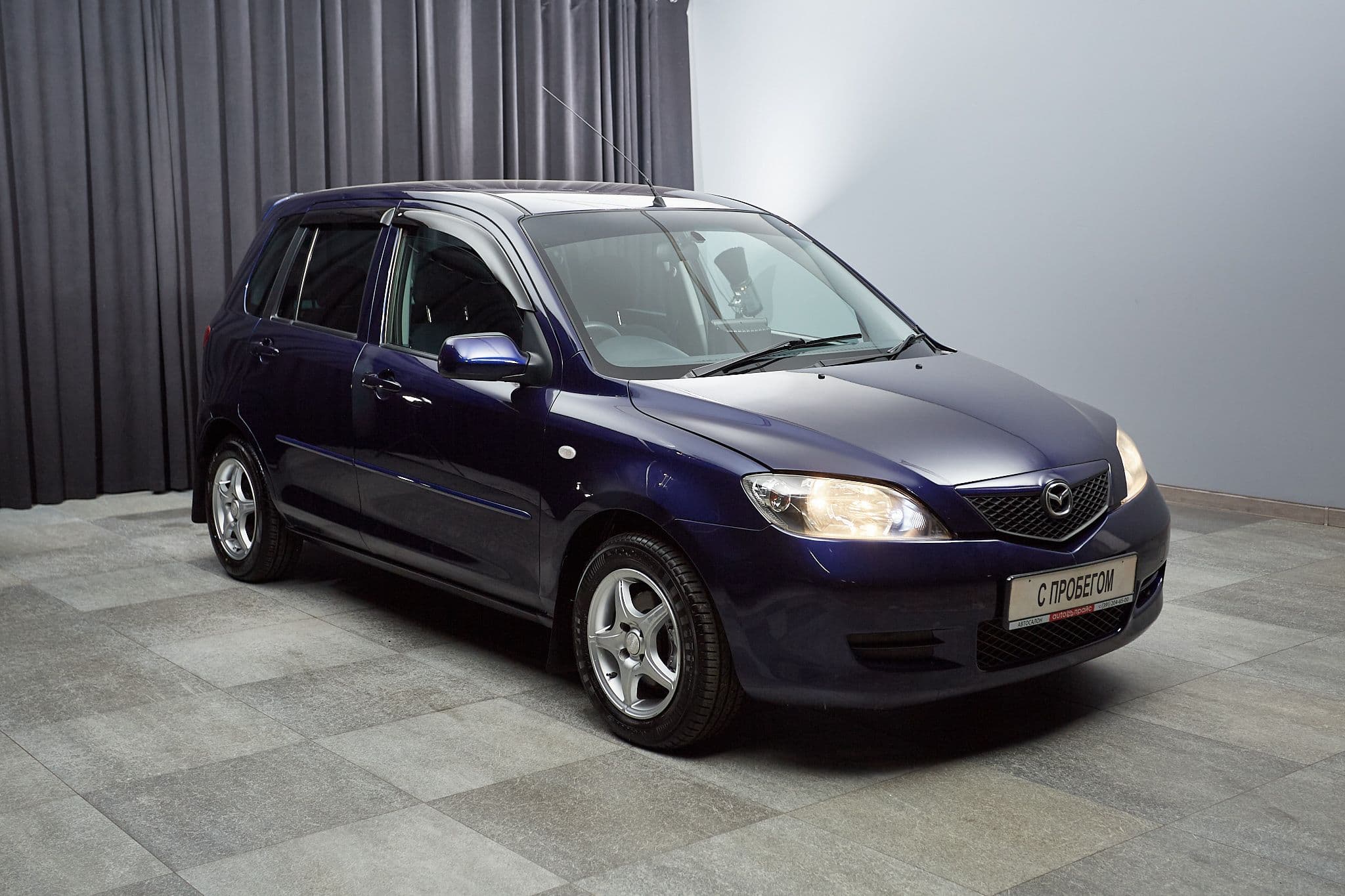 Mazda Demio - 3