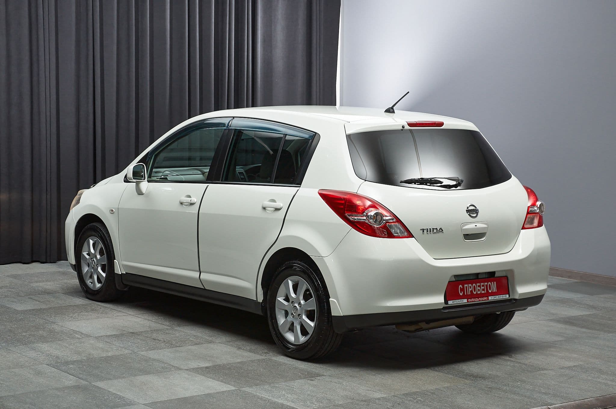 Nissan Tiida - 4